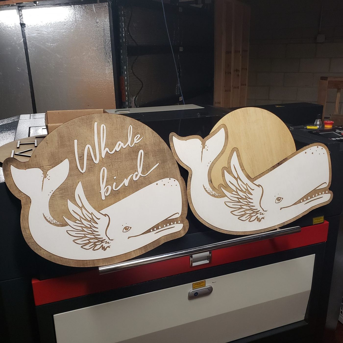 The Hidden Kitchen sign hung outdoors