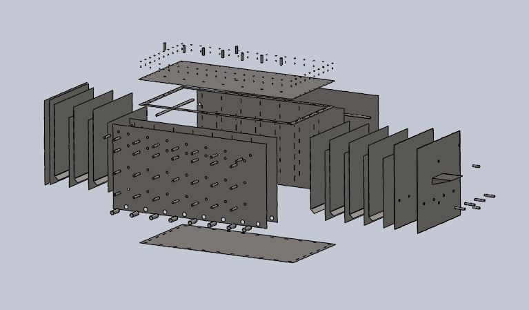 Exploded SolidWorks assembly of the baffled reactor, showing the internal baffle plates that stack inside the tank
