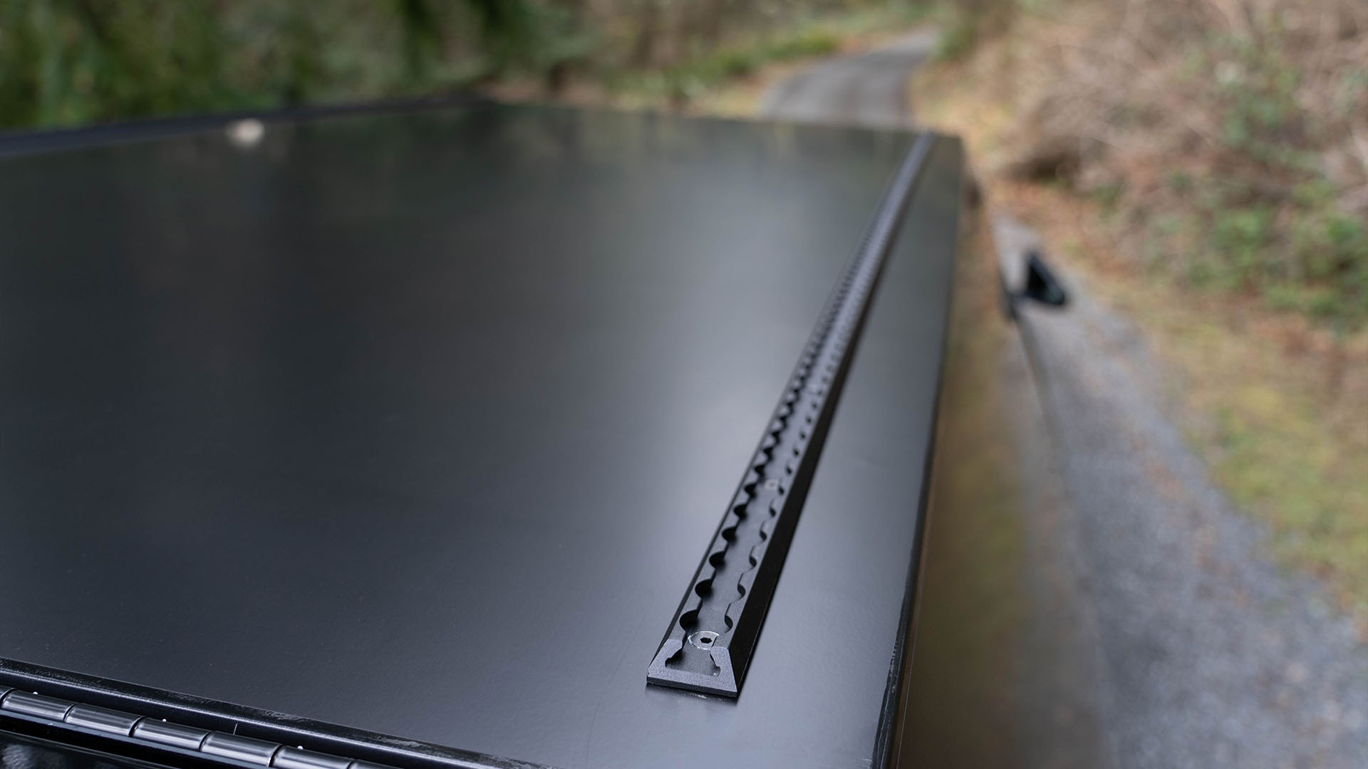 L-track roof runners are built into The Cap