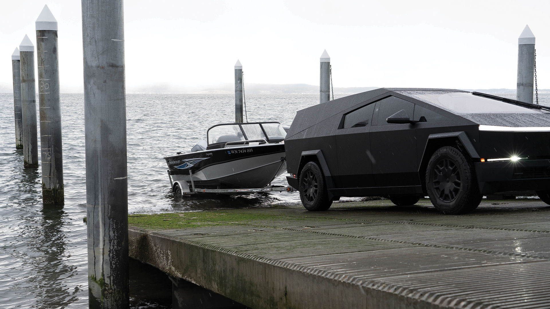 The Cybertruck towing a boat with Space Campers truck cap